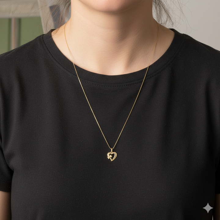 Gold Bow Adorned Heart Pendant & Necklace