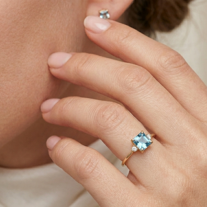 14K Gold Emerald Cut, Diamond Accented Baby Blue CZ Ring