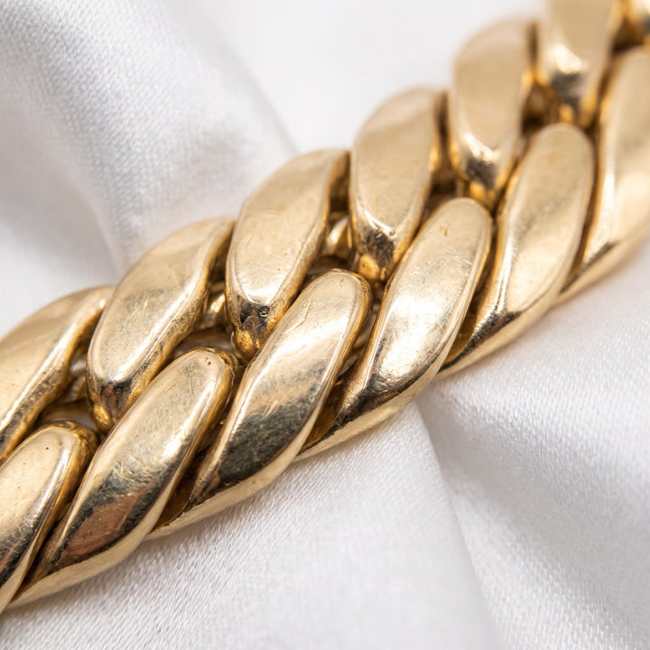18K Gold Dense Curb Link Statement Bracelet