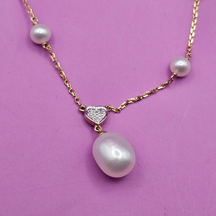 14K Gold, 8 Station Fresh Water Pearl Necklace