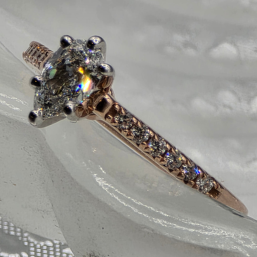 Diamond ring on a textured gray surface