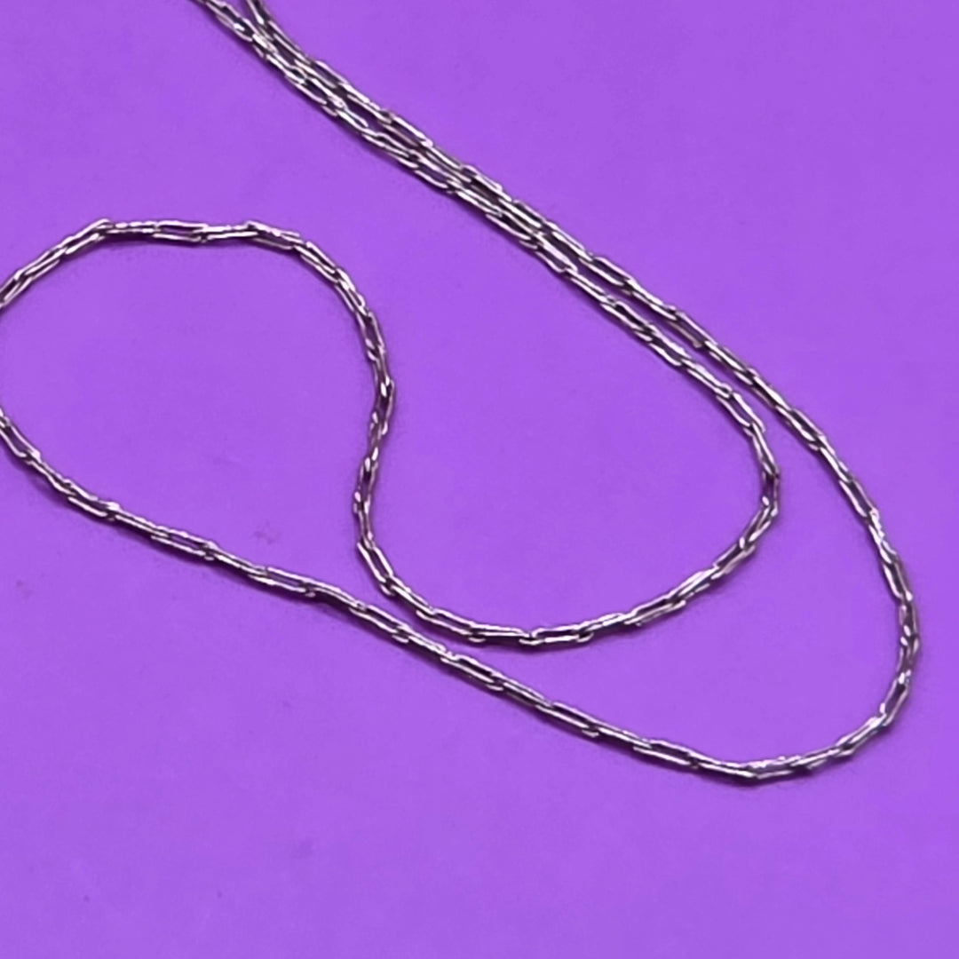 Gold Bow Adorned Heart Pendant & Necklace