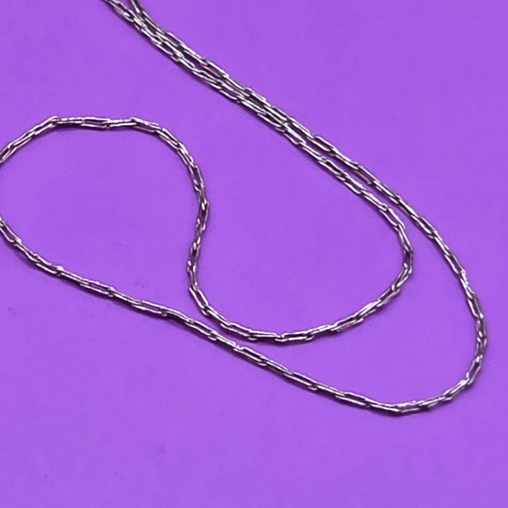 Gold Bow Adorned Heart Pendant & Necklace