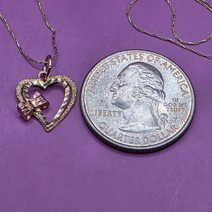 Gold Bow Adorned Heart Pendant & Necklace