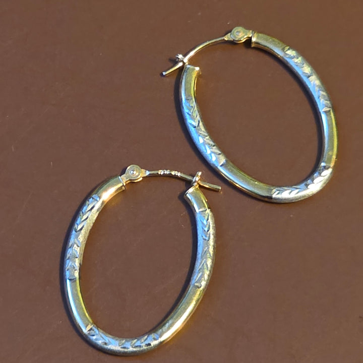 Gold Elongated Hoop Diamond Cut Earrings