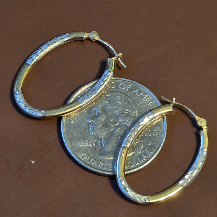 Gold Elongated Hoop Diamond Cut Earrings