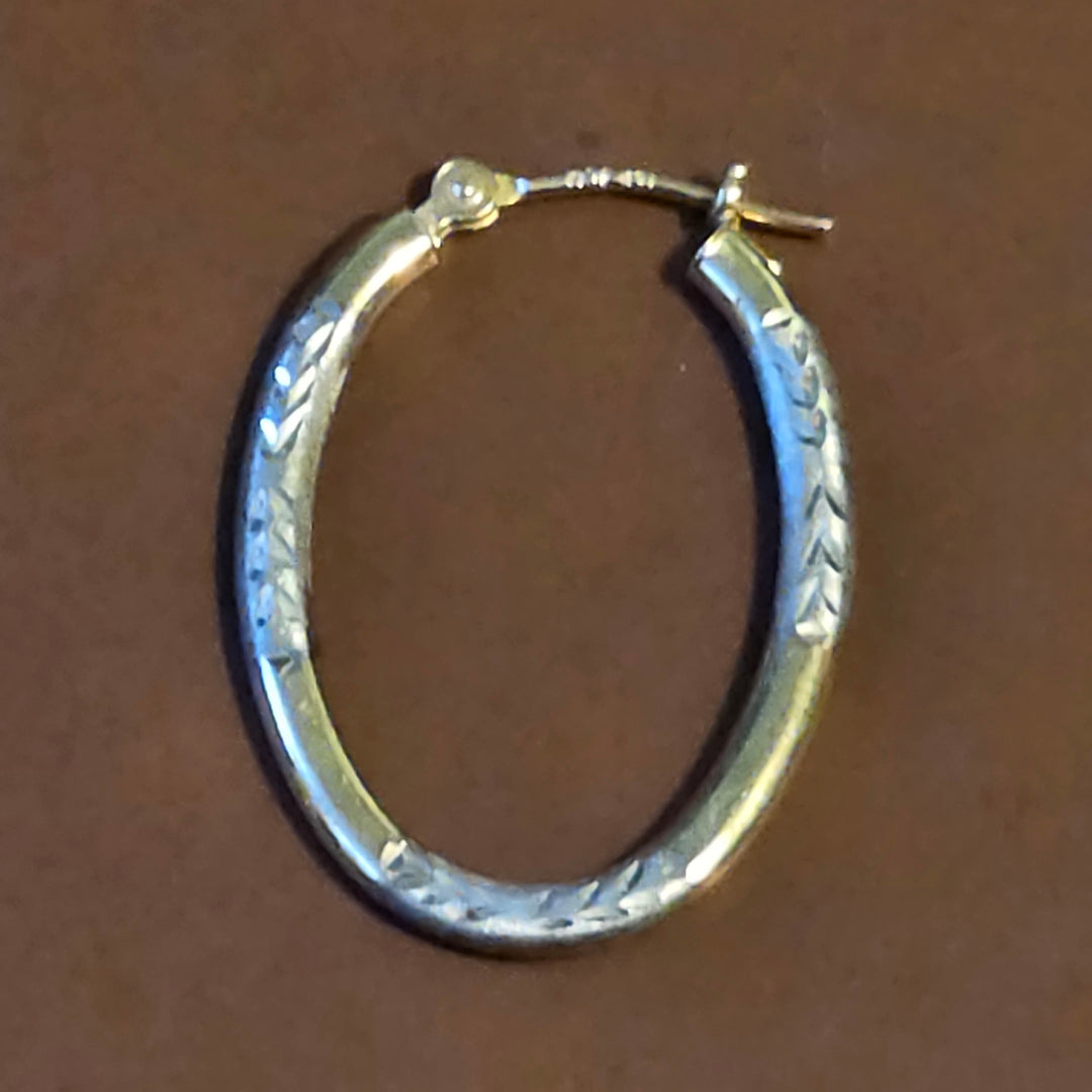 Gold Elongated Hoop Diamond Cut Earrings