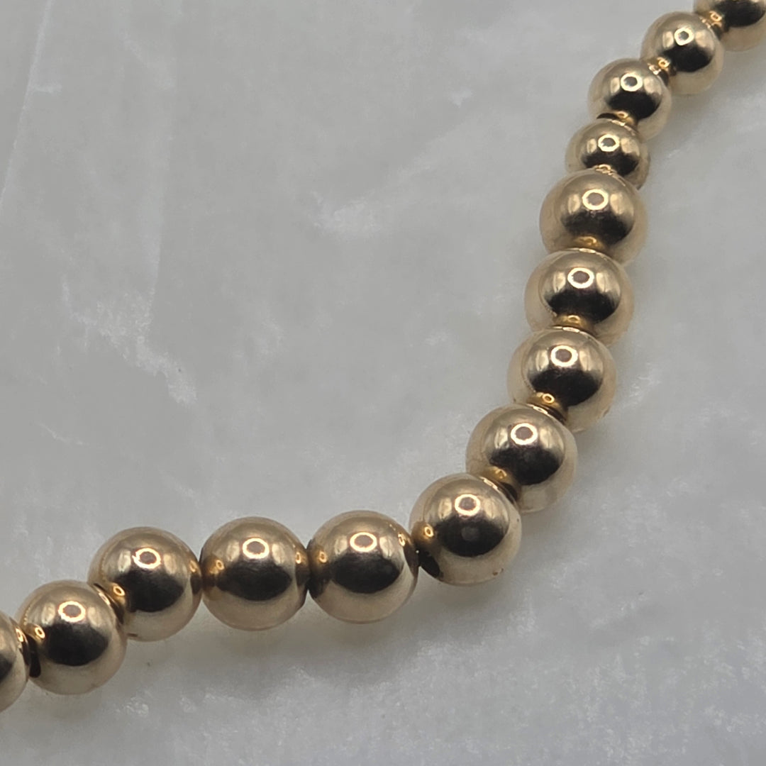 14K Gold Graduated Sliding Bead Necklace