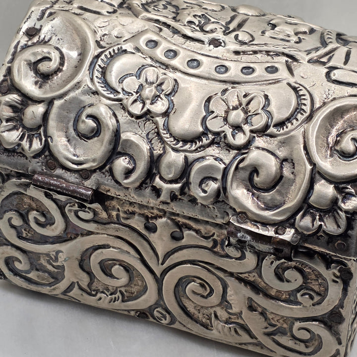 Repoussé and Chased Silver Miniature Domed-Top Chest